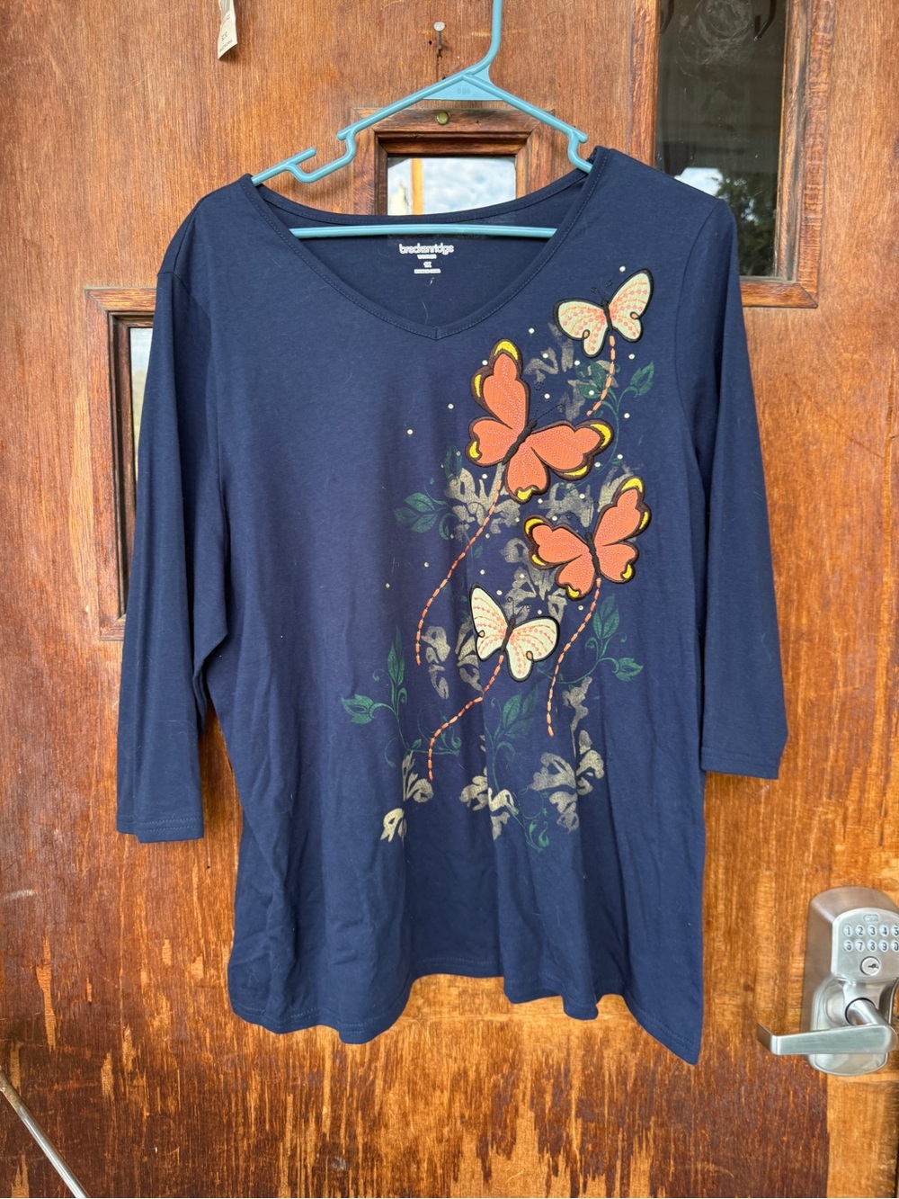 breckenridge Navy Long Sleeve V-Neck Top with Orange Butterfly Print